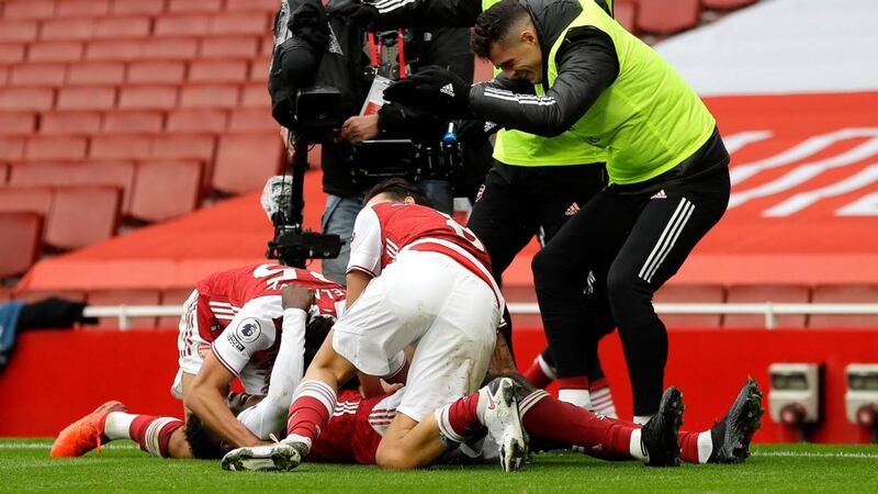 Arsenal’s Bukayo Saka celebrates scoring against Sheffield United with his team-mates. Photograph: PA