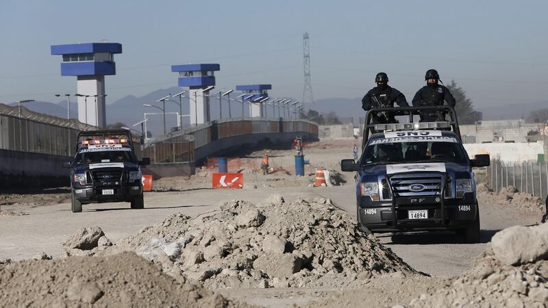 Federal agents and members of the Mexican Army patrol outside the high security prison Altiplano where Mexican drug trafficker Joaquin ‘El Chapo’ Guzman, is detained. Photograph: Jose Mendez/EPA