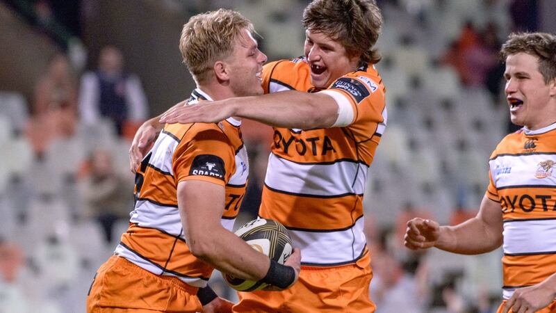 Gerhard Olivier celebrates scoring the opening try against Ulster. Photograph: Frikkie Kapp/Inpho