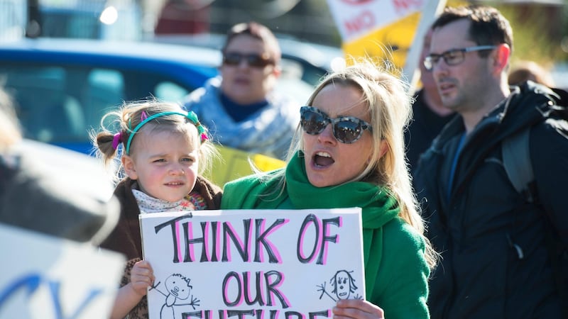 Charlotte Cargin with her daughter Eliza protest outside a Bord Pleanála oral hearing for an incinerator by Indaver. Photograph: Michael Mac Sweeney/Provision