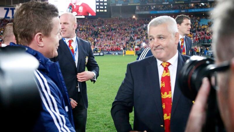 British and Irish Lions’ head coach Warren Gatland  shakes hands with  Brian O’Driscoll after winning the third Test and the series against Australia.