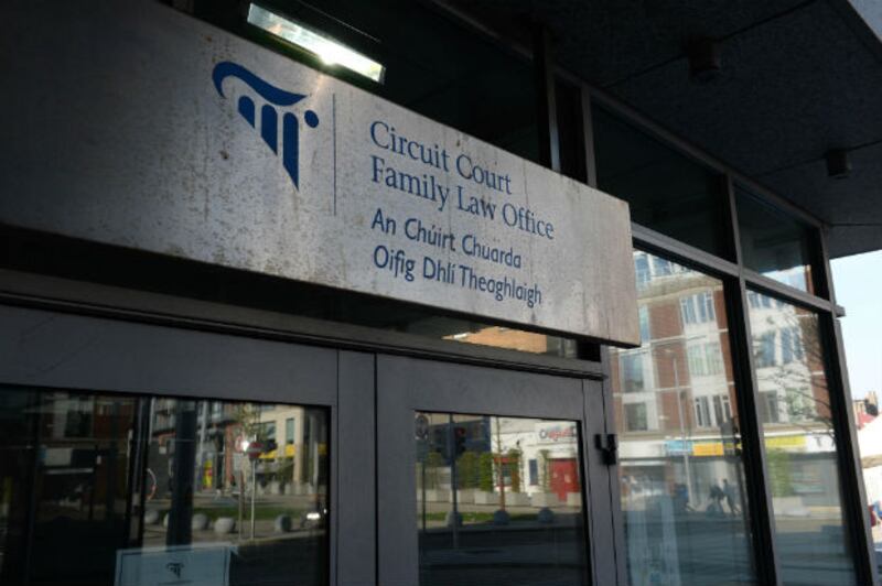 It’s impossible not to notice the ever-changing huddles of people near the doors of the Dublin Circuit Family Court, waiting for their cases to be called -- they look incredibly anxious.