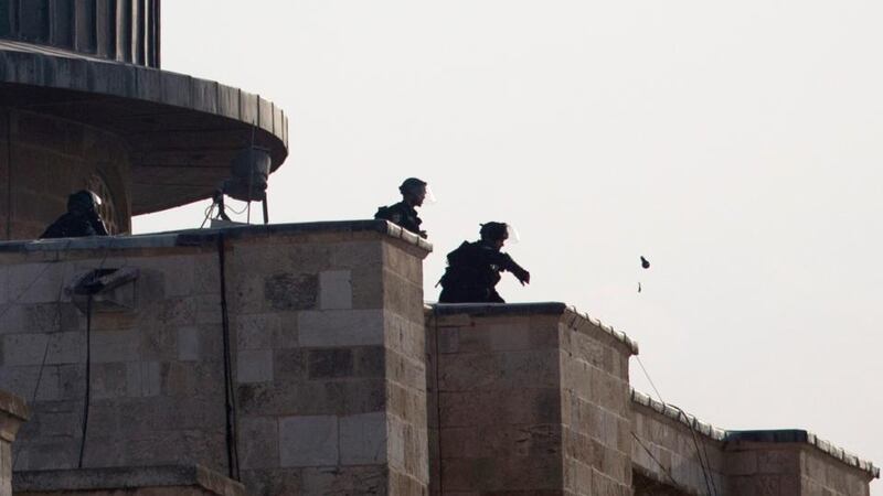 Israeli border police inside al-Aqsa mosque complex as clashes with Palestinians break out, in Jerusalem’s Old City. Photograph: Abir Sultan/EPA