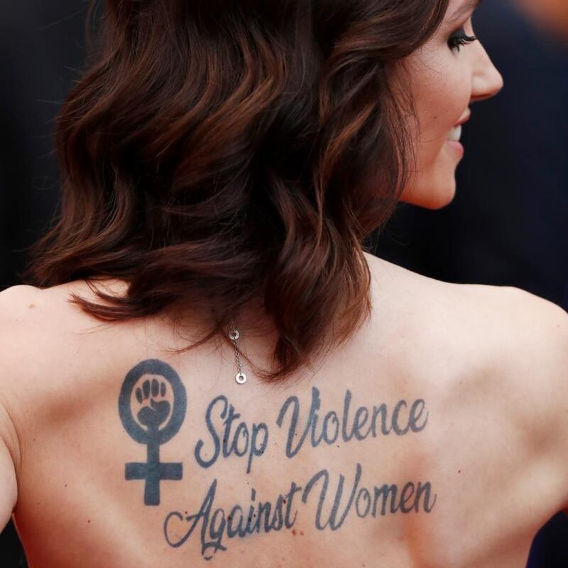 Stop Violence Against Women: Sand Van Roy’s Cannes tattoo. Photograph: John Phillips/Getty