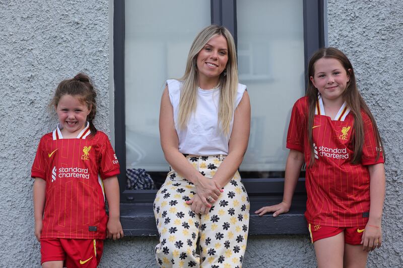 Grace Moore with two of her four children, Sadie (6) and Izzy (10).
Photograph: Alan Betson