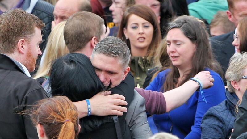 Family members console each other at the funeral of Steve Harris (34). Photograph: Colin Keegan/Collins.