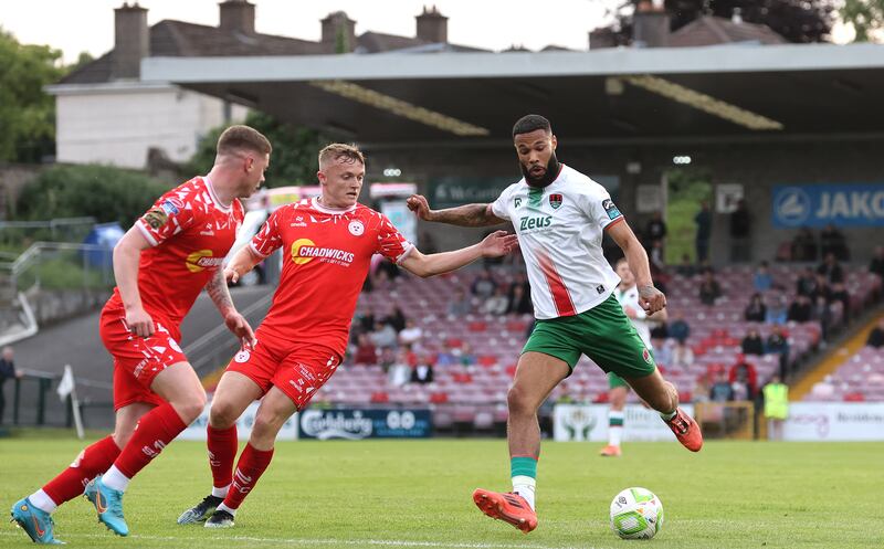 Shelbourne's JJ Lunney and Djenairo Daniels of Cork City. Photograph: INPHO/Bryan Keane