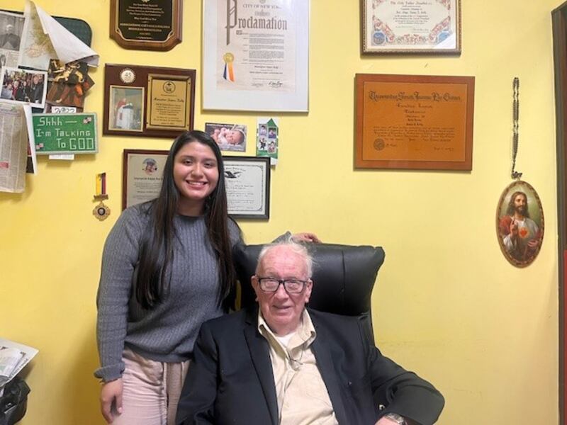Msgr James Kelly at the District Three Immigration Service with office manager Princess Reinoso. Photograph: Keith Duggan