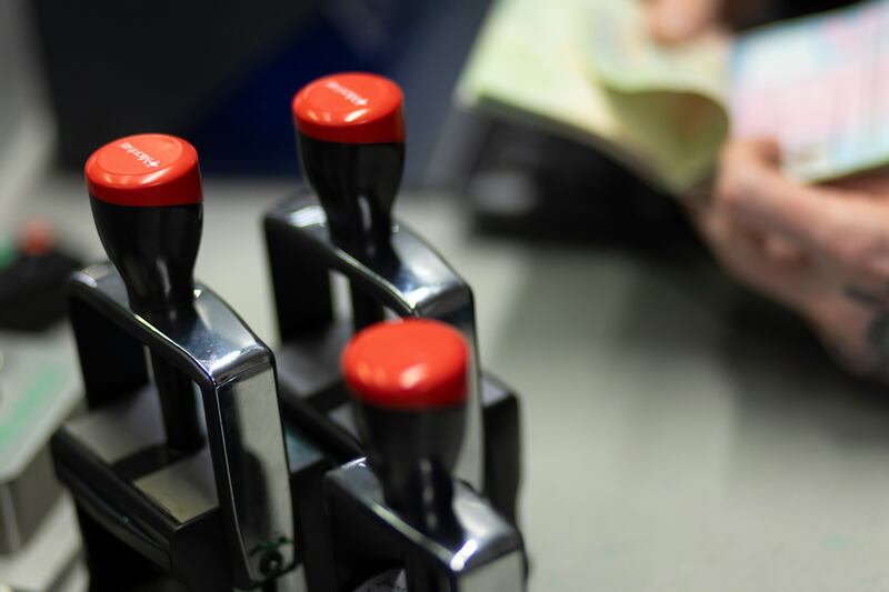 Passport stamps at the immigration control booth for arrivals at Dublin Airport. Photograph: Chris Maddaloni
