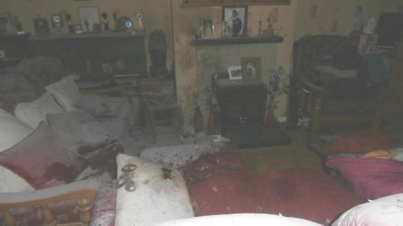 The sitting room of the Waterford house which was damaged in a petrol bomb attack. Photograph: Cllr John Hearne via Facebook