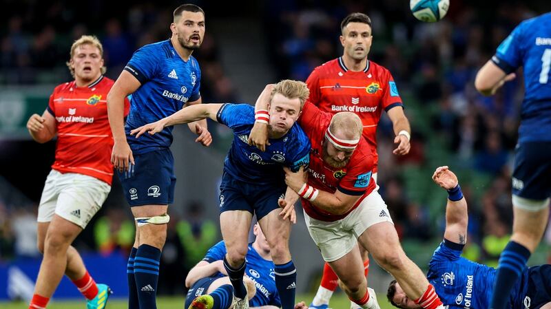 Leinster’s Ben Murphy is tackled by Jeremy Loughman of Munster during the United Rugby Championship match at the  Aviva Stadium. Photograph: Ben Brady/Inpho