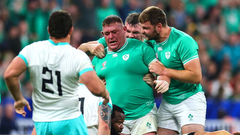 Peter O’Mahony and Iain Henderson celebrate a turnover with Tadhg Furlong during Ireland's 16th consecutive victory. Photograph: James Crombie/Inpho