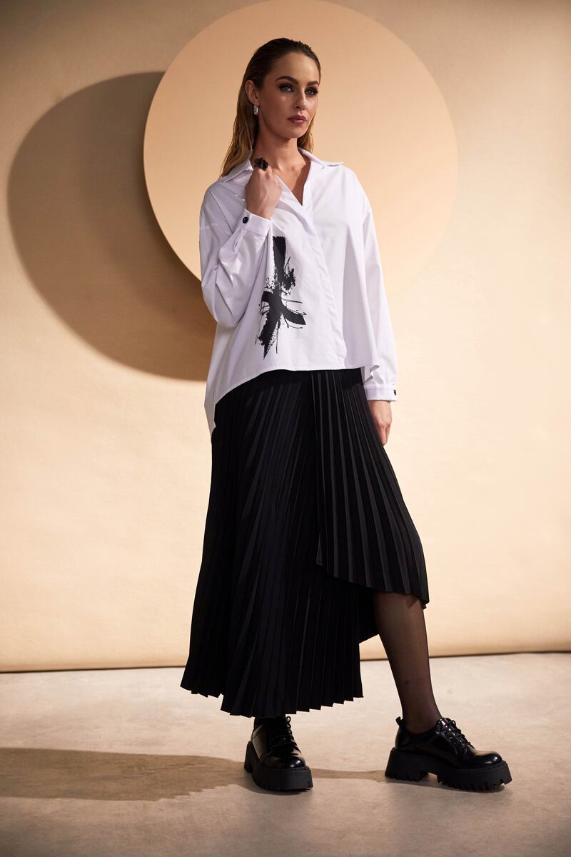 Placement print wrap shirt, €120, and pleated wrap skirt, €179, Naya (at boutique stockists nationwide)