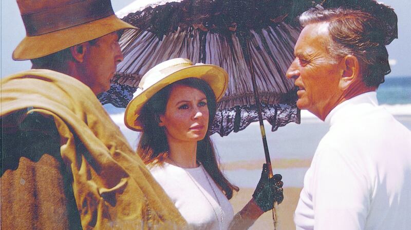 Robert Mitchum, Sarah Miles and David Lean on location