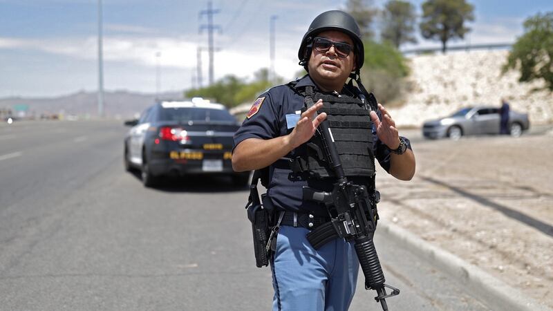 A police officer outside the mall, where an active shooter situation is ongoing. Photogprah: Ivan Pierre Aguirre/EPA
