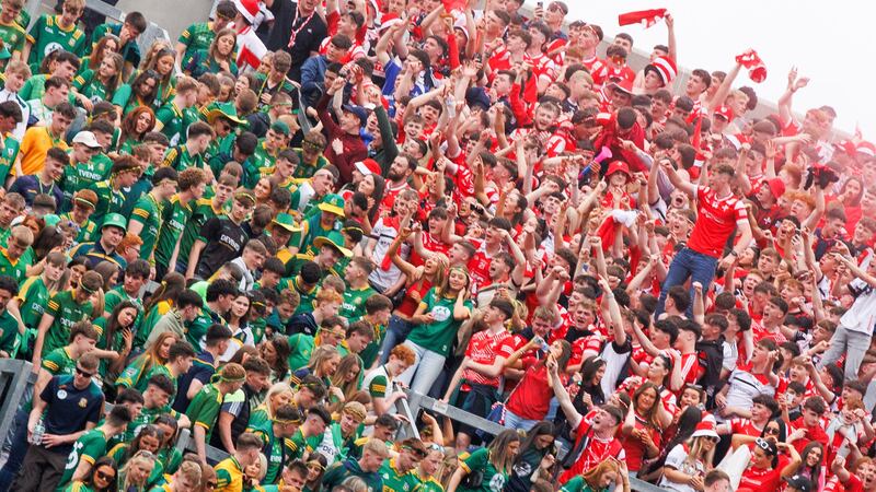 Louth fans celebrate winning as Meath fans look on dejected after the game. Photograph: Tom Maher/Inpho