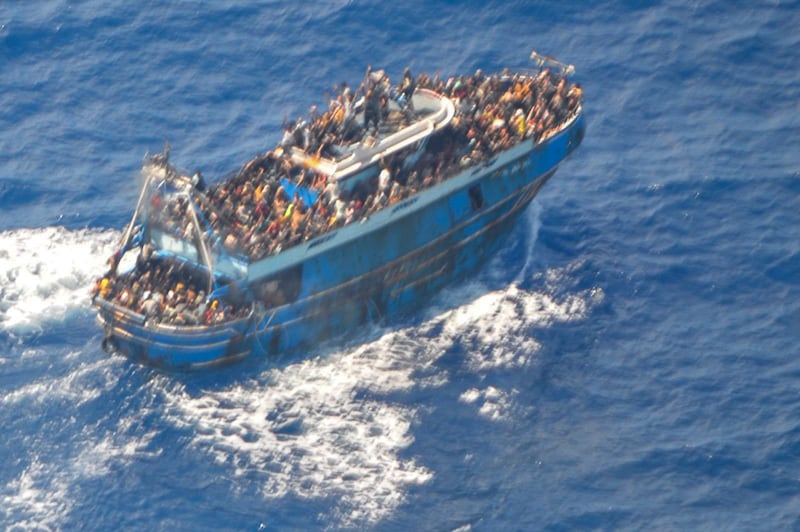 Sscores of people were crammed on to the battered fishing boat that later capsized. Photograph: Hellenic Coast Guard/AP