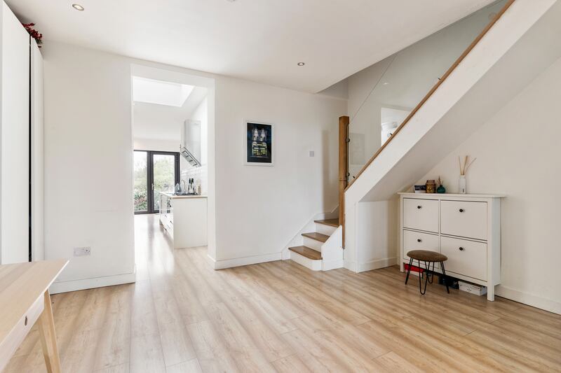 The stairs are made from pine with a glass stair rail, allowing light to flow freely