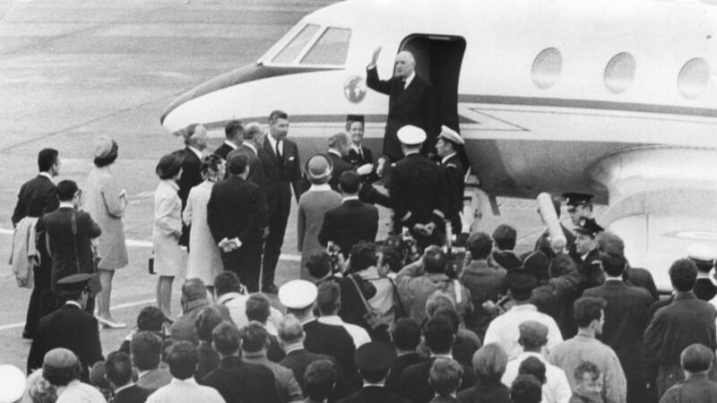 Charles de Gaulle waves goodbye from the steps of his  plane before leaving Dublin Airport for France. At the foot of the steps are the then taoiseach Jack Lynch and his wife, Mairin. Photograph: Dermot Barry