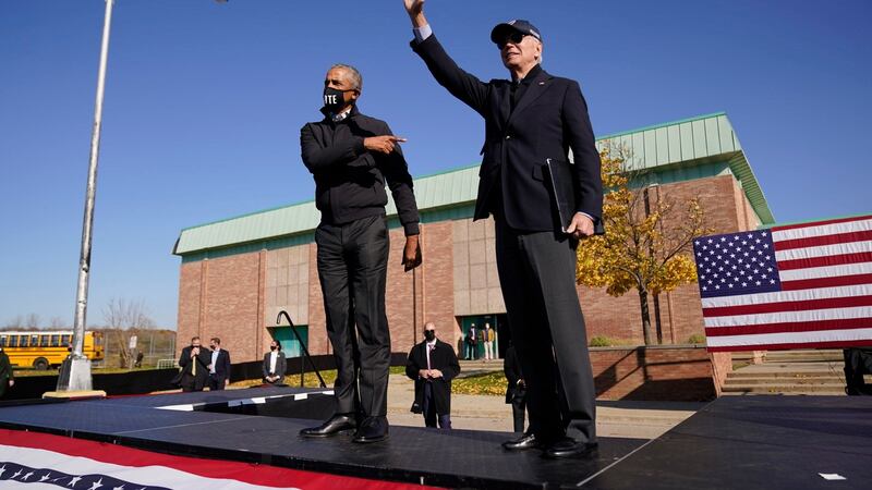 Democratic presidential candidate Joe Biden with former president Barack Obama at a rally at Northwestern High School in Flint, Michigan. Photograph: Andrew Harnik/AP Photo