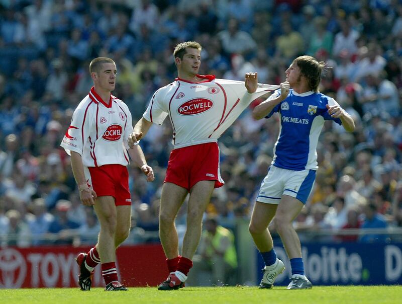Colm Parkinson of Laois has a run-in with Tyrone's Shane Sweeney during an All-Ireland qualifier in 2004. Photograph: Morgan Treacy/Inpho