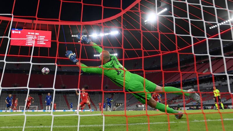 Robert Lewandowski opens the scoring for Bayern Munich from the penalty spot. Photograph: Matthias Hangst/Getty