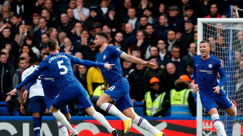 Olivier Giroud wheels away after scoring Chelsea’s opener against Tottenham. Photograph: Ian Kington/AFP/Getty