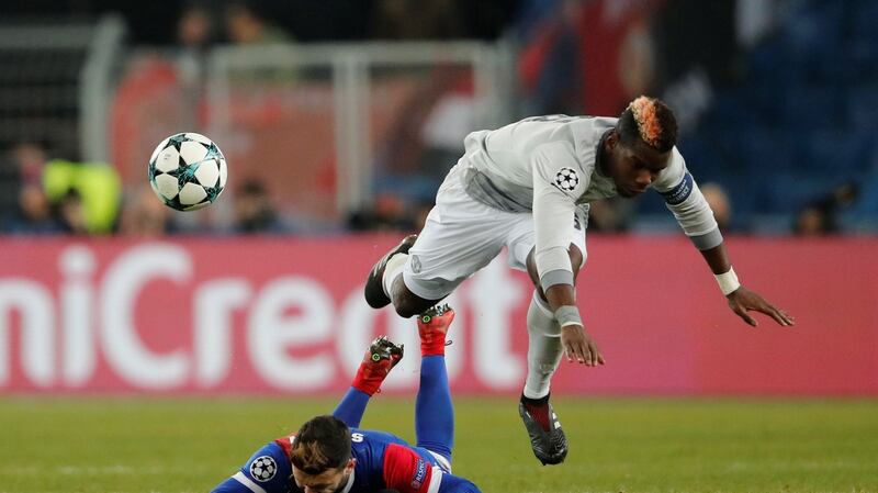 Basel’s Renato Steffen in action with Manchester United’s Paul Pogba during their Champions League clash. Photo: Arnd Wiegmann/Reuters