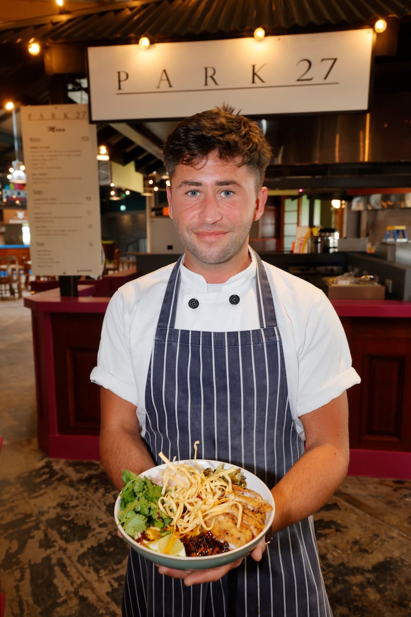Warren Mahon of Park 27 with khao soi gai - coconut curry broth served on egg noodles with chicken coriander lime, shallots and chilli oil