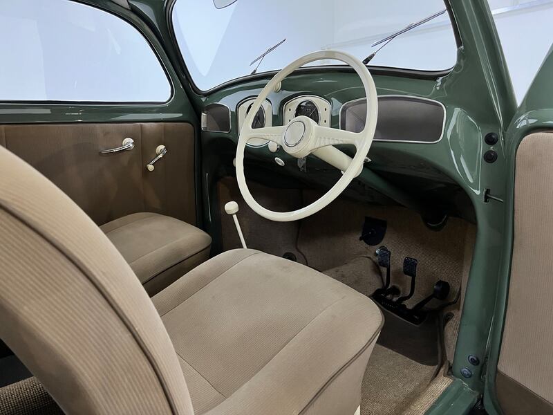 Finished in a fetching shade of almond green, the little Beetle exudes a cheerfulness extinct in most modern cars