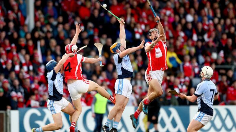 Na Piarsaigh’s’ Mike Casey and Niall Buckley compete for possession with Con O’Callaghan and Mark Schutte of Cuala during the AIB All-Ireland Club Senior Hurling Championship Final Replay at O’Moore Park in Portlaoise.  Photograph: James Crombie/Inpho