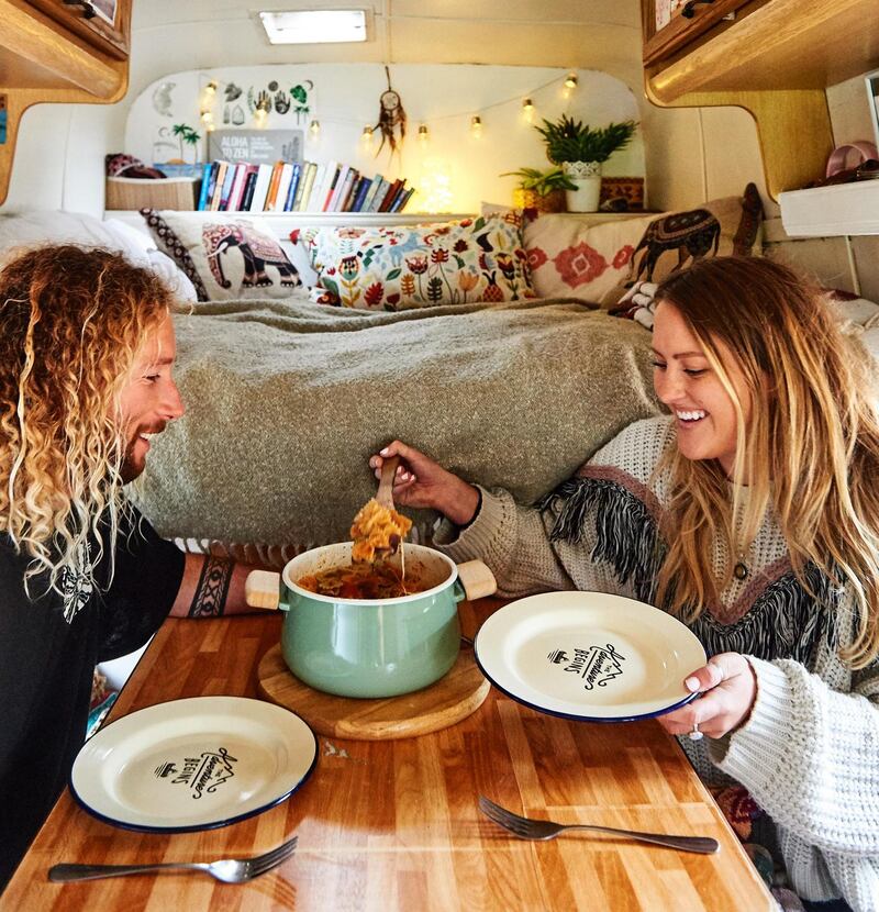 Marc H-B and Stephanie Rhodes, who spend their time on the Portuguese and Spanish coasts, in their 1996 Iveco Daily motorhome. Photograph: Sian Richards