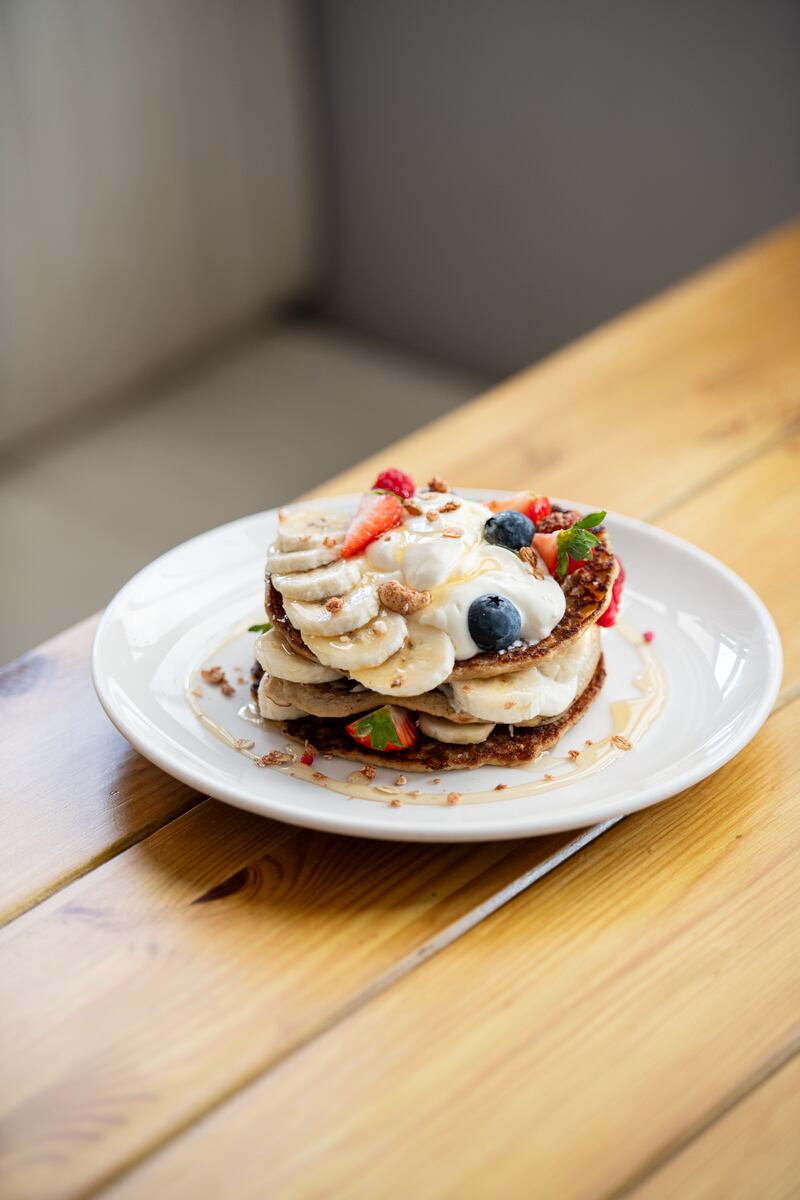 Póg's protein pancakes, lavishly topped with thick yoghurt and fresh fruit, have become a must-try
