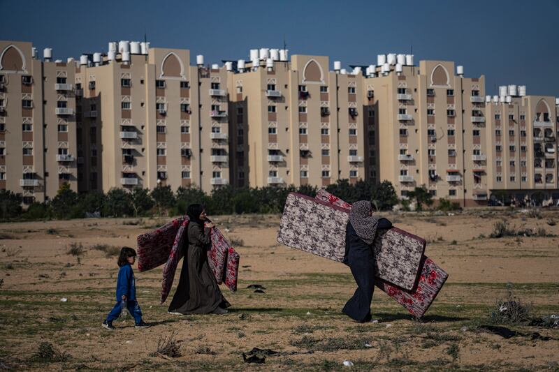 Palestinians fleeing from the east to the west of Khan Younis, south Gaza Strip. Photograph: Fatima Shbair/AP
