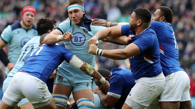 Mohamed Haouas of France punching Jamie Ritchie of Scotland at Murrayfield on Sunday. Photograph:  David Rogers/Getty Images
