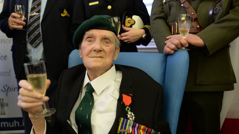 Sgtt Pat Gillen , who  landed on Sword Beach on June 6th, 1944, receives the Legion of Honour  at Mercy Hospital,  Cork, from the French ambassador in December 2014. Photograph: Artur Widak/NurPhoto  via Getty Images