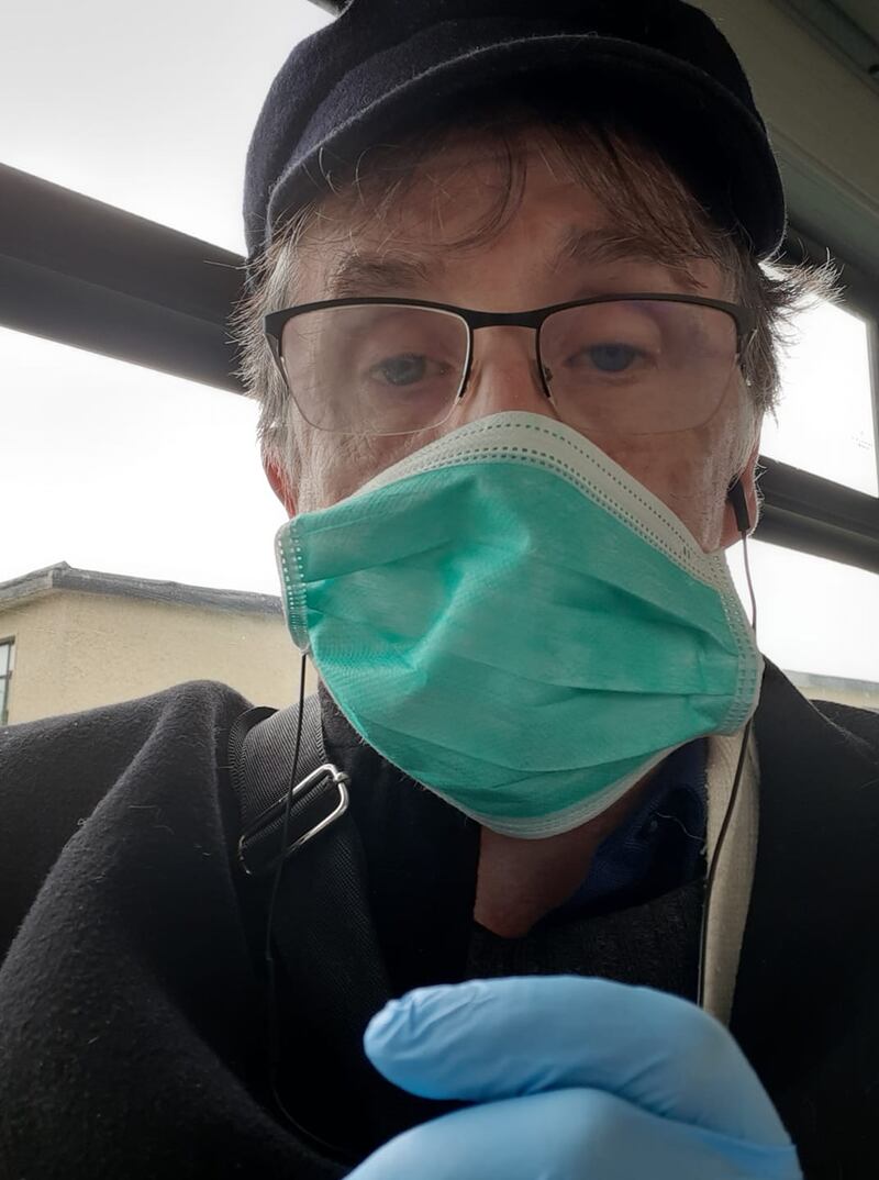 Kevin Higgins on the bus home from hospital