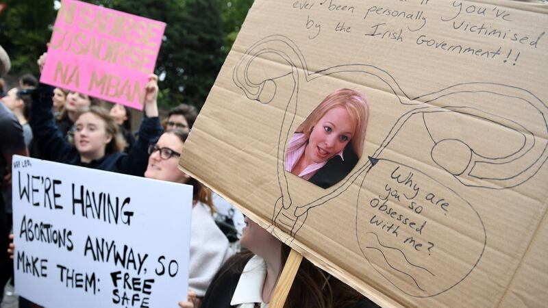 Protesters hold up placards during a London March for Choice on Saturday, calling for the legalisation of abortion in Ireland. Photograph: Chris J Ratcliffe/AFP/Getty Images