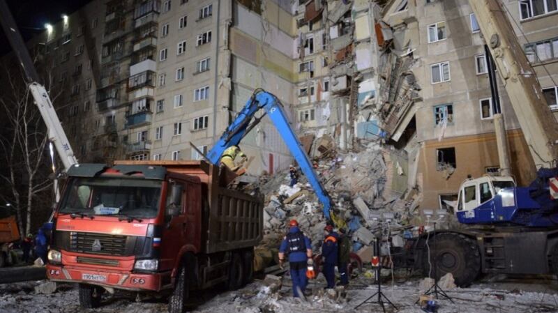 A handout photo from the Russian Emergency Situations Ministry Chelyabinsk Region shows  rescue workers removing  debris after a gas explosion in an apartment building in the city of Magnitogorsk. Photograph: EPA