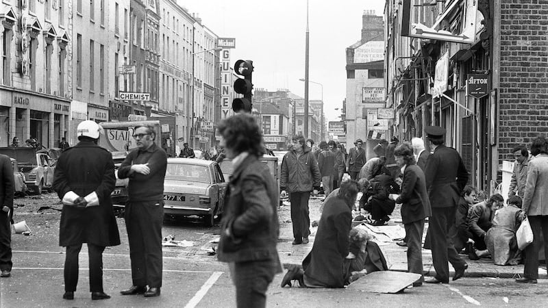 Members of the public tend to the injured following the detonation of a bomb on Talbot Street in Dublin in May 1974. Photograph: Tom Lawlor