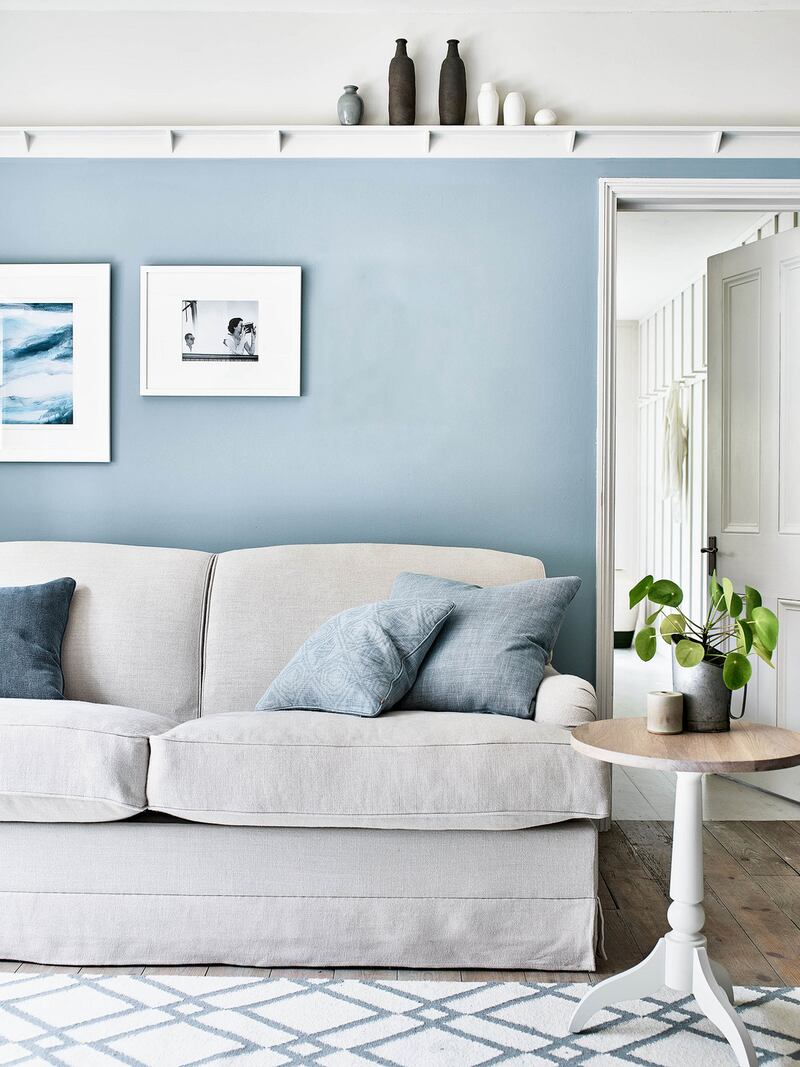 Calm and serene, Neptune’s new Olivia sofa bed in Hugo Pale Oat, €3,430, with flax blue walls and scatter cushions in Chloe denim and Harry flax blue,  from €62. See neptune.com