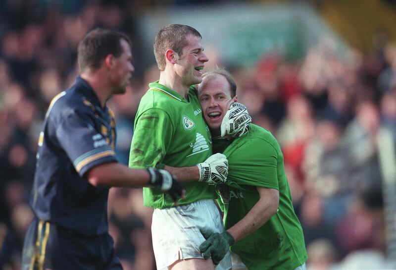 Anthony Tohill and Peter Canavan celebrate Ireland's victory over Australia in the second International Rules test in October, 1998. Photograph: Patrick Bolger/Inpho