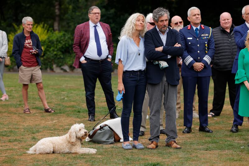 Charlie Bird with his wife, Claire, and dog Tiger in Dublin's Merrion Square. Photograph: Alan Betson
