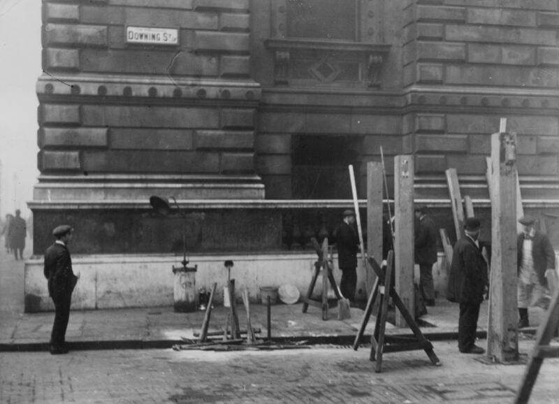 November 1921: workmen construct barricades at the entrance to Downing Street in London as protection against the IRA threat. Photograph:  Hulton Archive/Getty Images