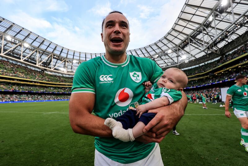 Ireland's James Lowe celebrates with his son Nico after the victory over England last month. 'With my wife and now, with our child, we’ve managed to move over here and really put our roots in the ground. I don’t see us leaving any time soon.' Photograph: Dan Sheridan/Inpho 
