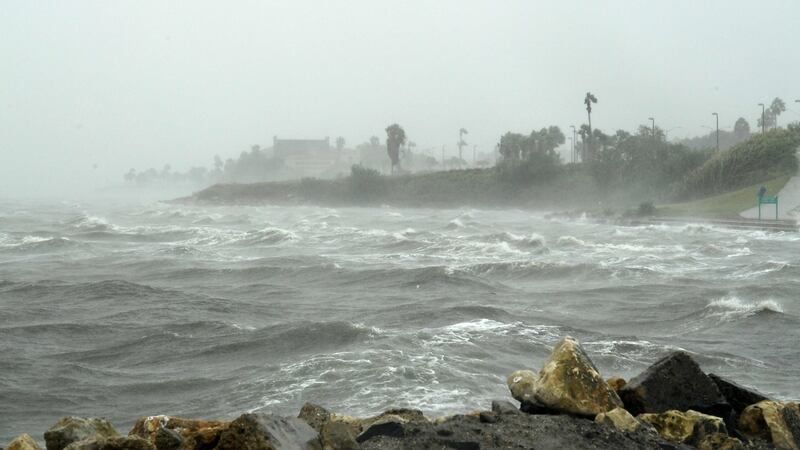 Winds batter seaside houses before the approaching Hurricane Harvey in Corpus Christi, Texas on August 25th, 2017.  Photograph: Mark Ralston/AFP/Getty Images