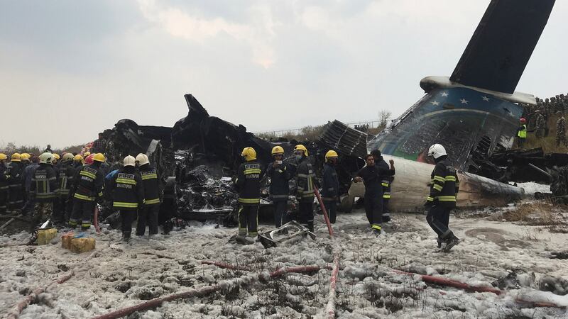 Wreckage of an airplane is pictured as rescue workers operate at Kathmandu airport, Nepal on March 12th, 2018. Photograph: Navesh Chitrakar/Reuters