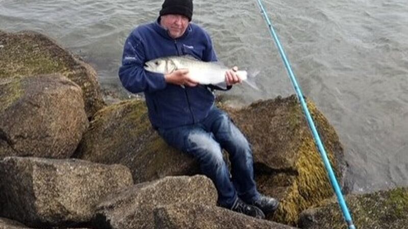 Anthony Downey from Drimnagh with his possible specimen bass of 10lb from the Shelley Banks, Pidgeon House Road, Dublin, last Wednesday, which he returned to the water