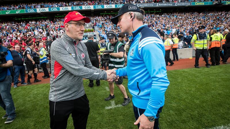 Mickey Harte and Jim Gavin shake hands at the end of last year’s semi-final. Photo: Inpho