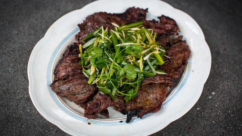 Skirt steaks is marinated in a simple combination of soy, ginger, chilli and sesame oil